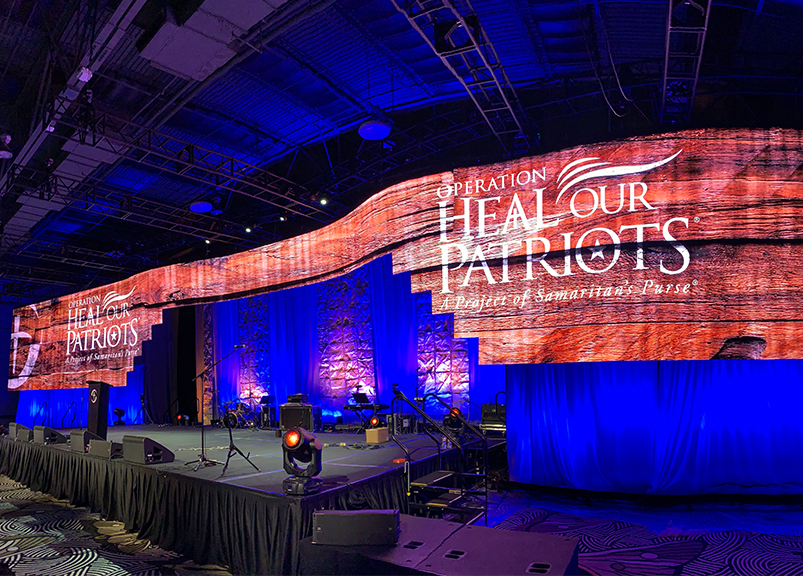 Comparison of Dallas LED wall rentals versus projector setups for events.