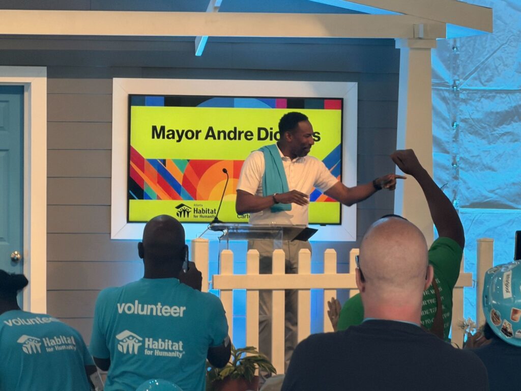 Atlanta Mayor Andre Dickens speaking on stage at the 40th Carter Work Project